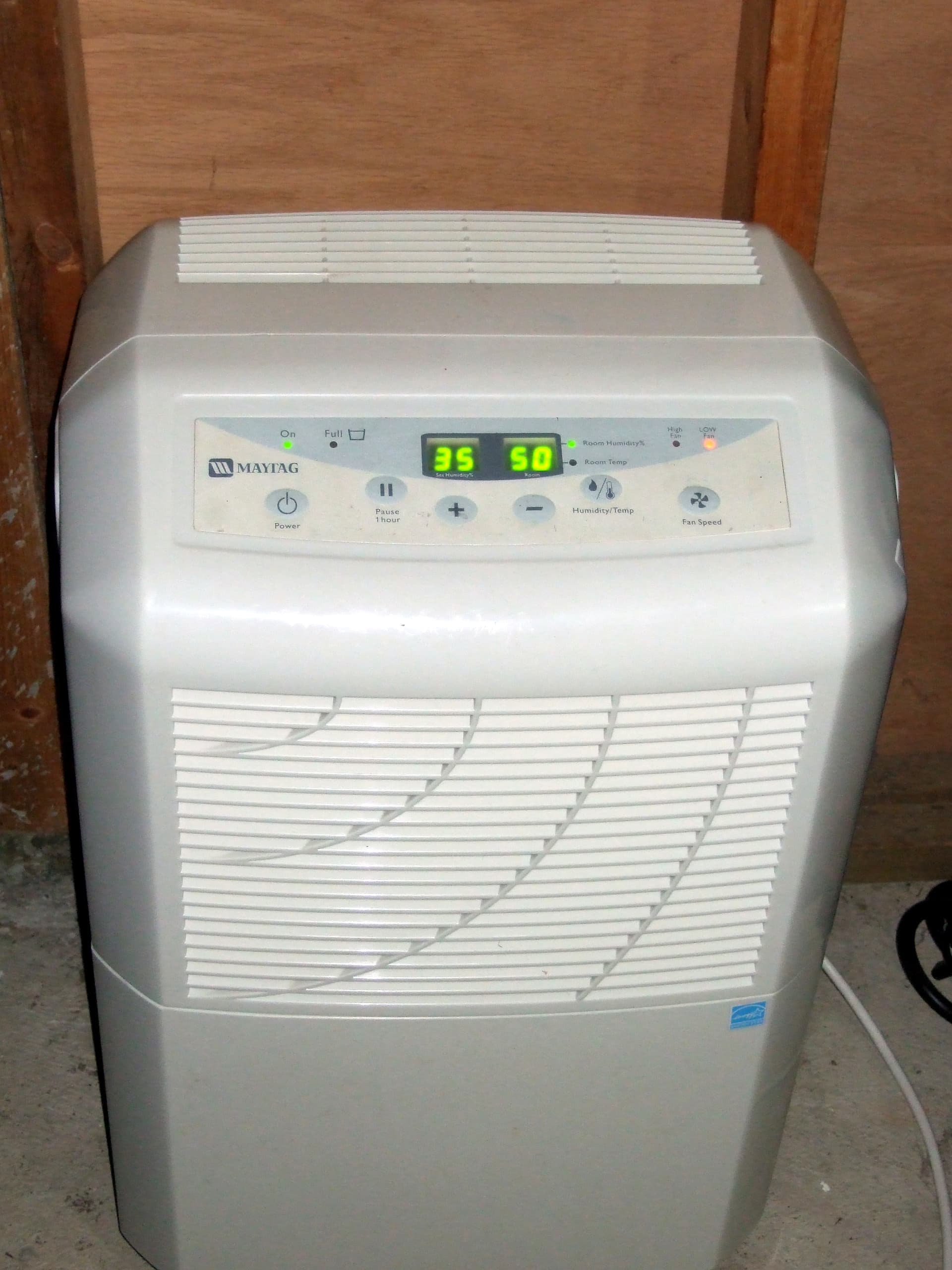 Commercial dehumidifiers and air movers used in structural drying after water damage