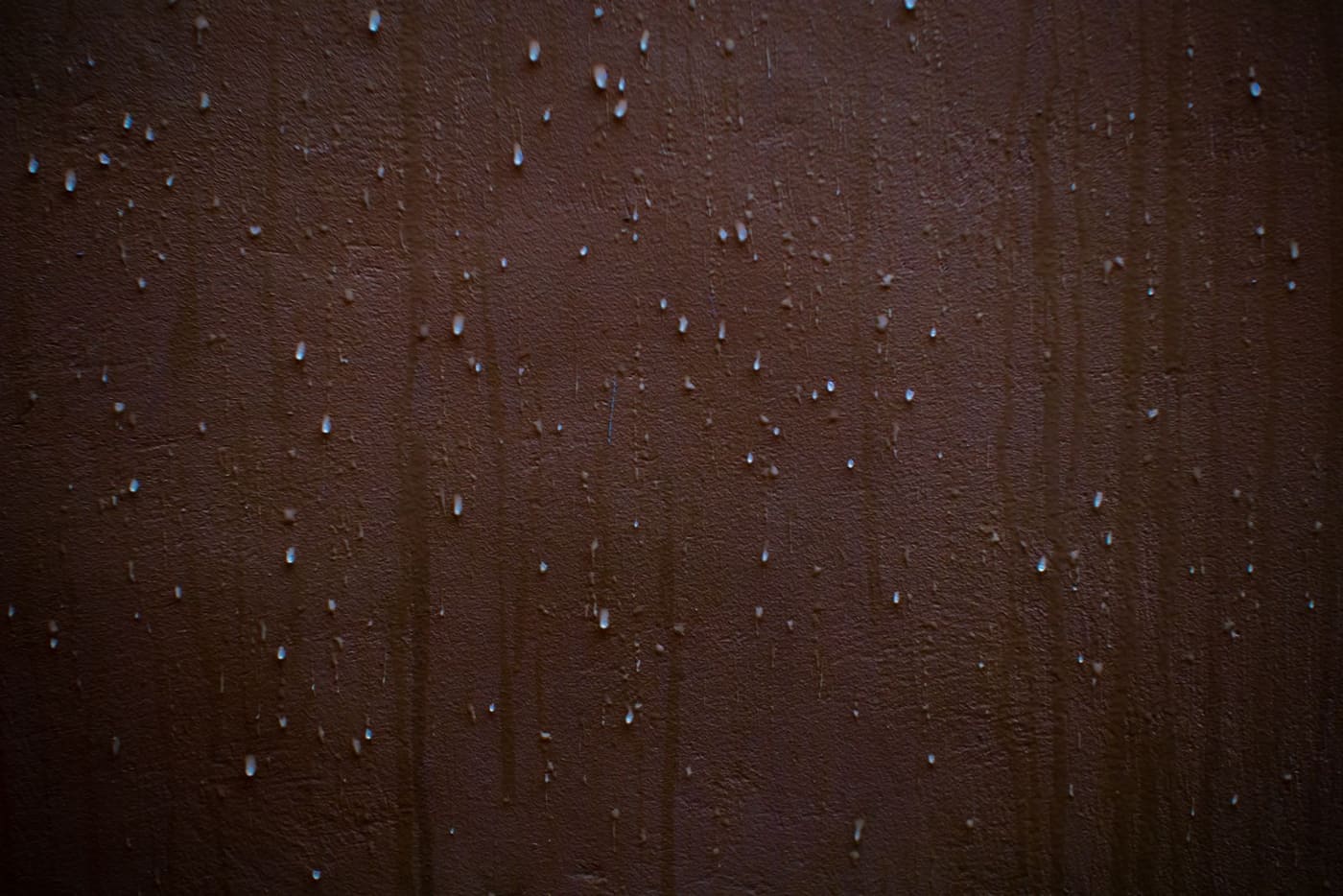 Condensation and moisture streaks on an interior wall
