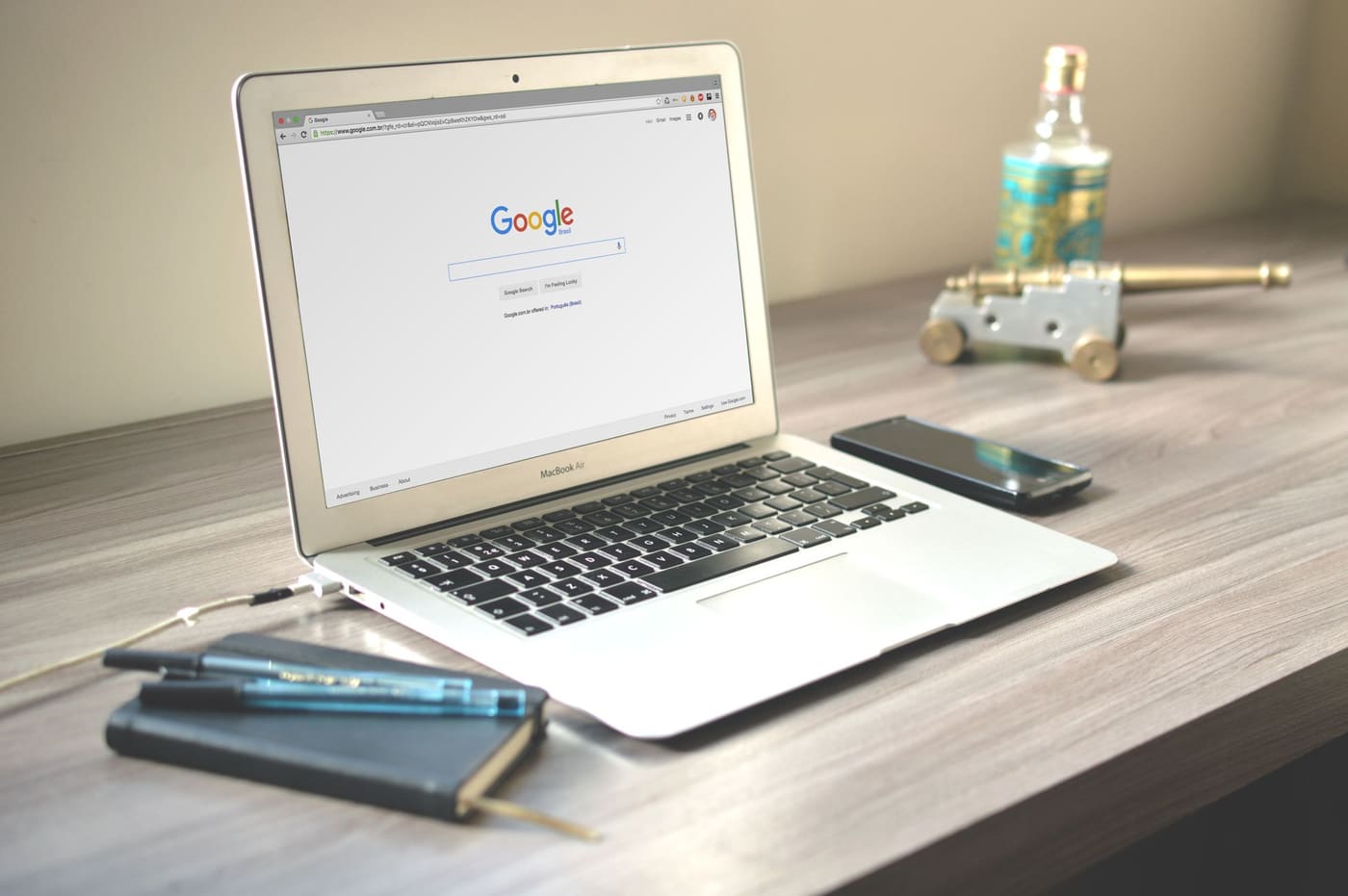 Homeowner researching restoration companies on a laptop