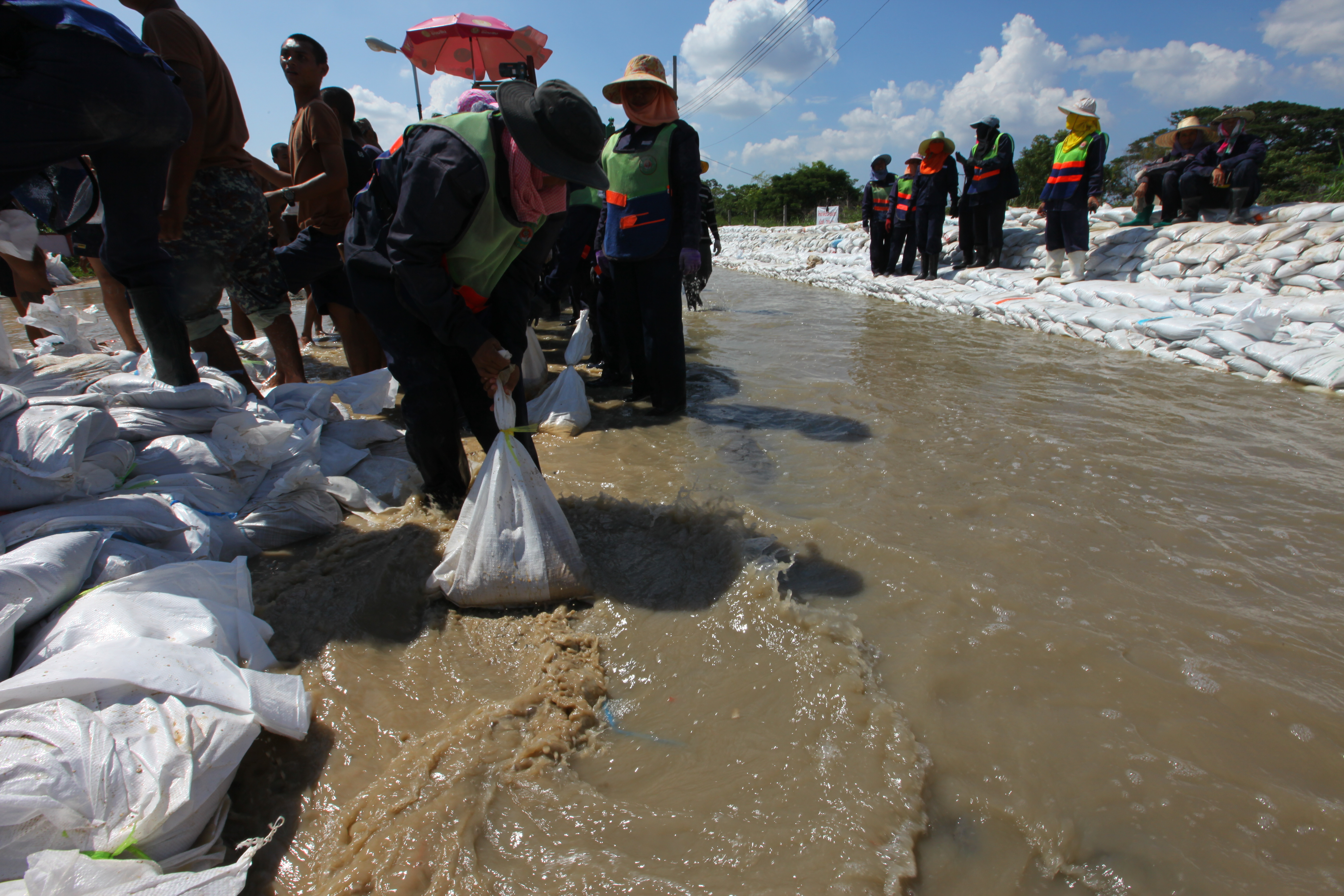 Sandbag barrier protecting homes during flood in Bangkok, Thailand